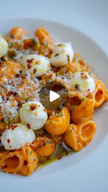 Yarin Shachagi on Instagram: "Cherry Tomato & Basil Pasta

This pasta is my go-to for a dinner that feels fancy while still being fairly easy to make. I like to add fresh herbs and a bit of basil oil to enhance the flavors. The Mozzarella pearls also lend a nice creaminess to the rich cherry tomato sauce.

Ingredients:

- 1/2 pound pasta
- 1 cup heavy cream
- 3/4 cup grated Parmesan cheese (reserve some for serving)
- 1 tablespoon tomato paste
- 4-6 garlic cloves, minced
- 1/4 cup white wine
- 1 teaspoon chili flakes (reduce if preferred less spicy)
- 2 teaspoons black pepper
- Kosher salt, to taste
- 4 tablespoons olive oil or unsalted butter
- 1 1/2 cups cherry tomatoes, halved
- 2 tablespoons fresh basil, chopped
- ⁠1 teaspoon fresh oregano (optional)

For Serving:
- 2 tablespoons fresh Tomato Mozzarella Basil, Creamy Tomato Pasta, Gourmet Pasta, Mozzarella Pearls, Tomato Pasta Recipe, Cherry Tomato Recipes, Mozzarella Pasta, Cherry Tomato Sauce, Tomato Basil Pasta