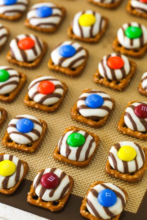 Hugs And Pretzels, M And M Pretzel Treats, Pretzel Square Treats, Pretzels With Kisses And M&ms, Hersey Kisses Pretzel, Pretzel With M&m, M&m Pretzels, Hugs Pretzels M&m, Pretzel Hershey Kiss M&m Recipes