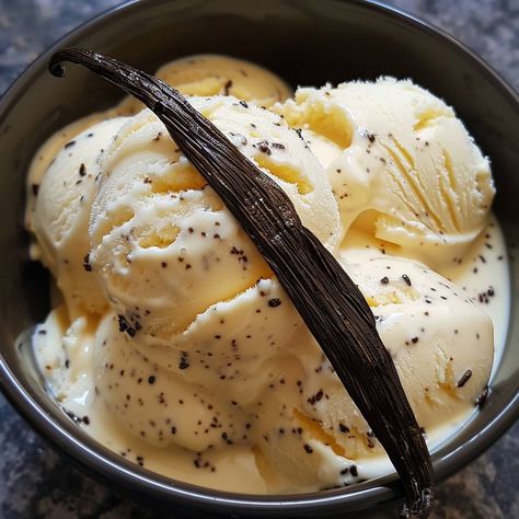 🍦🌿 Indulge in Homemade Vanilla Bean Ice Cream, a creamy classic that's pure and simple! #VanillaIceCream #HomemadeDelight 🍽️ Homemade Vanilla Bean Ice Cream 🛒 Ingredients: 500 ml heavy cream 250 ml whole milk 150 grams sugar 1 vanilla bean, split and scraped 6 egg yolks 👩‍🍳 Instructions: Infuse Milk: Combine cream, milk, vanilla bean (pod and seeds), and half the sugar. Simmer, then remove vanilla pod. Mix Yolks: Whisk yolks and remaining sugar. Temper with hot cream mixture. Cook Custard... Homemade Vanilla Bean Ice Cream, Vanilla Pod, Bean Ice Cream, Instagram Recipes, Twisted Recipes, Ice Cream Ingredients, Vanilla Bean Ice Cream, Egg Yolks, Trending Recipes