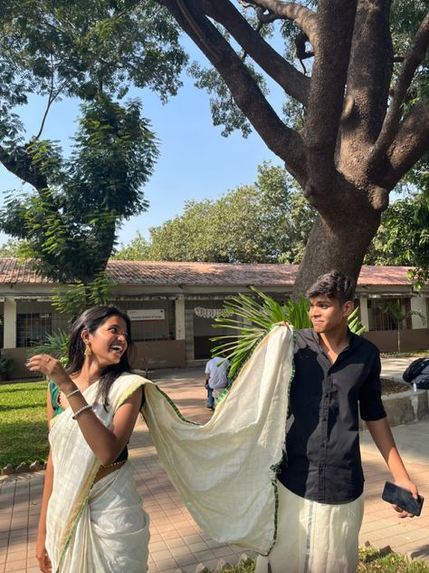 Couple Poses For Onam, Saree Couple Pics, Couples Saree Poses, Onam Couple Photos, Onam Aesthetic Pics, Couple Saree And Kurta, Couple Photo Poses In Saree, Farewell Poses With Boyfriend In Saree, Couple Pic Indian