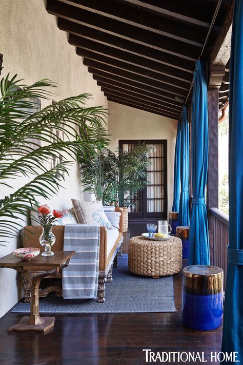 spanish colonial porch with royal blue curtains and palm plants Spanish Porch Ideas, Spanish Curtains, Spanish Porch, Spanish Balcony, Mediterranean Countryside, Tuscan Home Interior, Jacuzzi Deck, Colonial Porch, Royal Blue Curtains