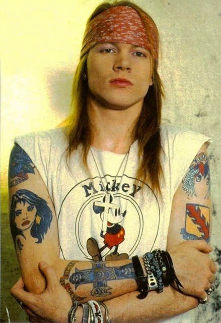 This is what Axl Rose used to look like... as far as bad boys go, he wasn't bad. Just not sure what happened to him NOW. Axl Rose Tattoo, Axl Rose Slash, Man With Long Hair, Rose Tattoo Meaning, Rose Tattoo On Arm, Axel Rose, Tattoos Meaning, Army Tattoos, 80s Fashion Trends