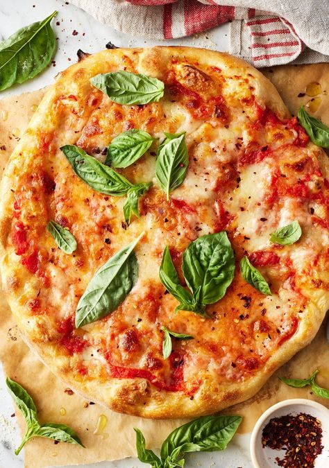 This homemade margherita pizza is so easy and delicious! My biggest tip for this recipe is to use good-quality ingredients like fresh basil and sauce made with San Marzano tomatoes. Because the recipe is so simple, you'll really taste the difference. Pate A Pizza, Spinach Artichoke Pizza, Margherita Pizza Recipe, Fancy Pizza, Artichoke Pizza, Easy Summer Dinners, Fresh Tomato Sauce, Pizza Sauce Homemade, Best Vegetarian Recipes