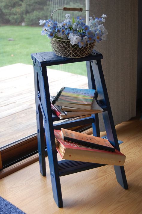 Bought this small step ladder for my kitchen.  Painted it and put my cookbooks on it. Small Step Ladder Decor Ideas, Small Wooden Ladder Ideas, Small Ladder Decor, How To Decorate Old Wooden Ladders, Old Ladders Repurposed, Mini Wooden Ladder Decor, Mini Ladder Decor Ideas, Ladder Decor Ideas, Mini Ladder Decor