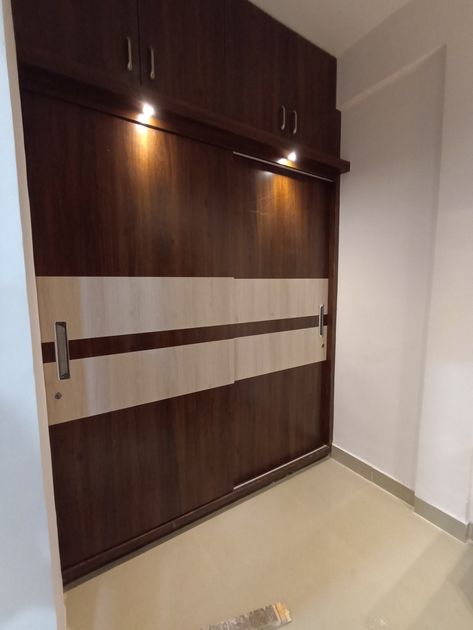 Wooden Colour Wardrobe Design, Cupboard Door Design Master Bedrooms, Wooden Laminate Wardrobe, Bedroom Wardrobe Colour Combination, Wardrobe Laminate Design Master Bedrooms, Wooden Wardrobe Design Bedroom, Laminate Combination, Slider Wardrobe Design, Walking Wardrobe