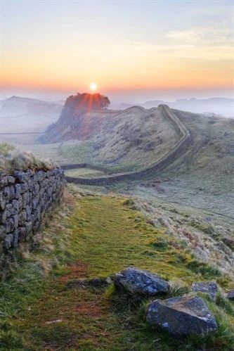 Hadrian's Wall (Latin: Vallum Aelium), also known as the Roman Wall, Picts' Wall, or Vallum Hadriani in Latin, is a former defensive fortification of the Roman province of Britannia, begun in AD 122 in the reign of the emperor Hadrian. Hadrian’s Wall, Hadrian's Wall, Roman Britain, Hadrians Wall, English Countryside, Places Around The World, Dream Vacations, Beautiful World, Travel Dreams