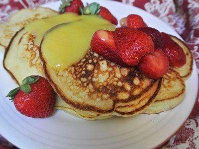 Ricotta Pancakes with Lemon Curd and Strawberries First Watch Lemon Ricotta Pancakes, Pancakes With Lemon Curd, Lemon Ricotta Pancakes Recipe, French Toast Pancakes, Lemon Ricotta Pancakes, Ricotta Pancakes, First Watch, Curd Recipe, Lemon Ricotta