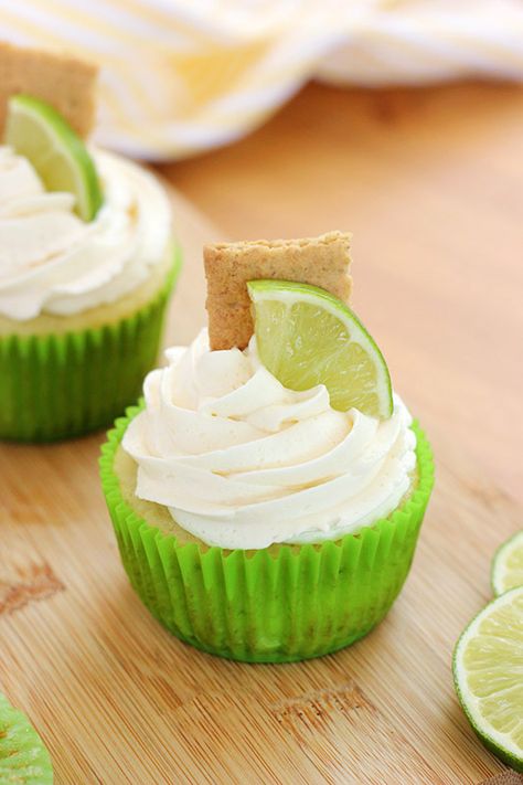 These fluffy Key Lime Cupcakes are a summer favorite! Made with a graham cracker crust and topped with a lime filled cupcake that is out of this world delicious. The secret is in the filling! Fluffy Vanilla Cupcake Recipe, Key Lime Pie Cupcakes, Buttermilk Cupcakes, Key Lime Cupcakes, Lime Cupcakes, Lime Desserts, Chicory Recipe, Vanilla Cupcake Recipe, Buttercream Cupcakes