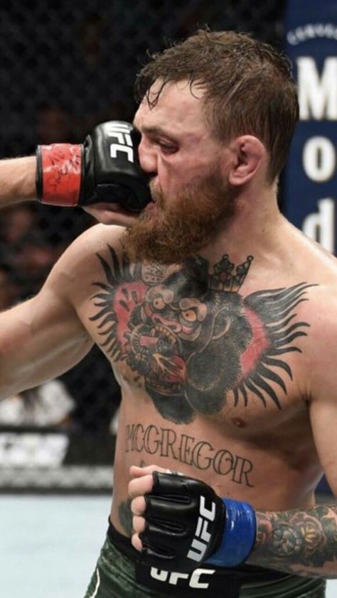 Conor McGregor gets punched by Khabib Nurmagomedov during UFC 229. Medium Length Beard, Conor Mcgregor Wallpaper Hd, Conor Mcgregor Hairstyle, Connor Macgregor, Conor Mcgregor Wallpaper, Conner Mcgregor, Mcgregor Wallpapers, Conor Mcgregor Style, Medium Beard Styles