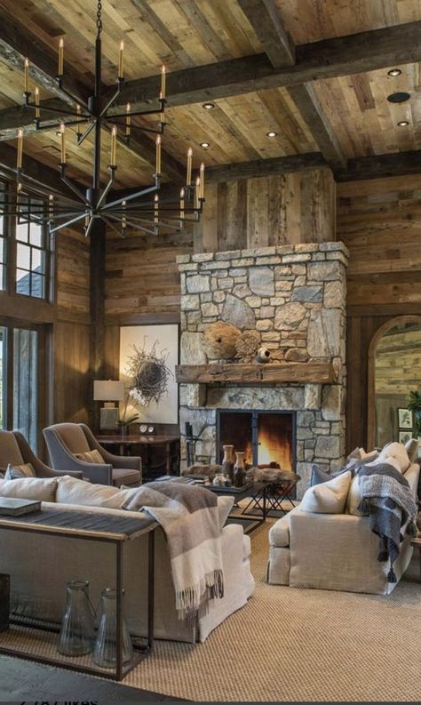 Mountain Lodge Home Interiors, Rustic Walkout Basement, Master Bedrooms With Green Accents, Mountain House Great Room, Woodsy Chic Decor, Montana Lodge Decor, Stamped Concrete Fireplace, Aspen Mountain House, Mountain Home Light Fixtures