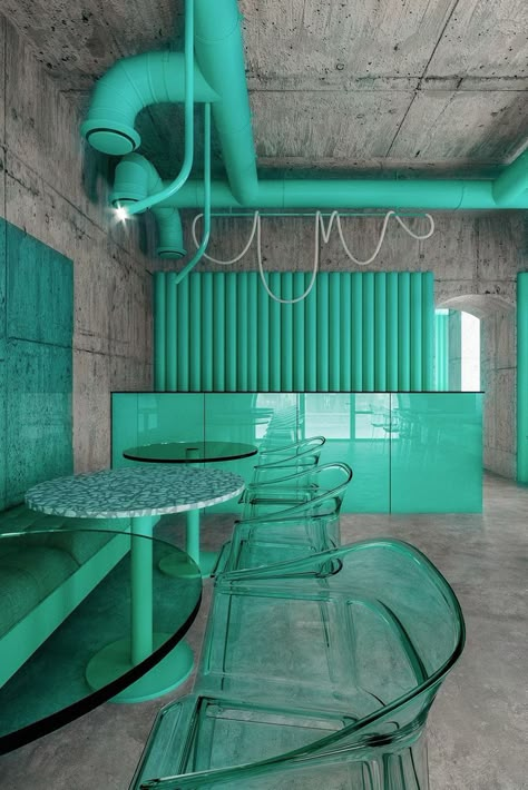 A bright, colorful implementation, where bamboo sprouts break through the gray concrete-like stalks. An unusual atmosphere, inside which the designer decided to leave the old concrete walls of the old building and highlight objects, tables, chairs, ventilation, glass panels in green tones against the background of a rough texture. #architonic #nowonarchitonic #design #architecture #interiordesign #projectdesign #interiorinspiration #moderninterior #concreteinterior #coffeeinterior #designlover Nature Cafe, In Harmony With Nature, Harmony With Nature, Bar Interior, Coffee Shop Design, Cafe Interior Design, Blues Clues, Restaurant Interior Design, Office Interior