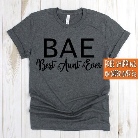 #clothing #unisexadultclothing #topstees #auntgift #pregnancyshirt #auntshirt #giftforsister #auntiegift #auntieshirt #bestauntieshirt #bestauntiegift #bestauntieever #bestauntever #newauntiegift #newauntieshirt #giftfornewaunt #auntie #auntshirts #babyshark Funny Grandma Shirts, Quotes For Shirts, Best Aunt Ever, Aunt Shirt, Aunt T Shirts, Gift For Aunt, Aunt Life, Auntie Shirts, Best Aunt