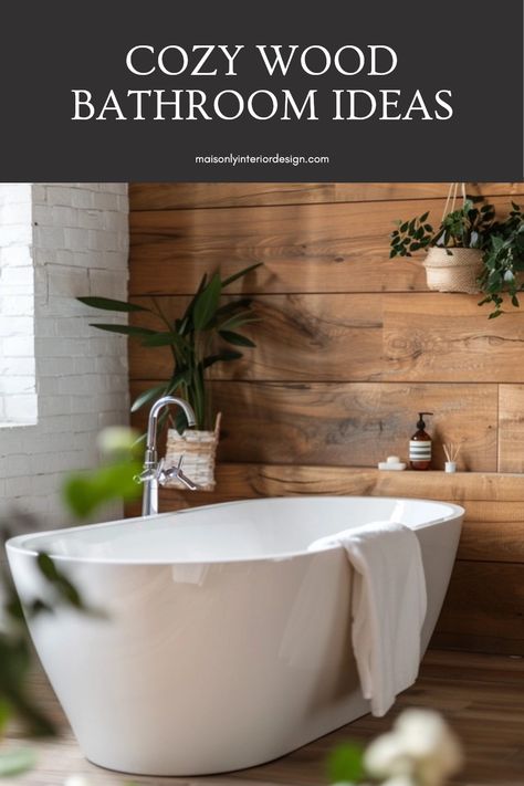 Explore cozy wood bathroom ideas for a warm and inviting atmosphere. This pin highlights rustic designs and wooden decor to create serene spaces. Wood Wall Bathroom Modern, Wood Accent Wall In Bathroom, Wood Backsplash Bathroom, Warm Wood Bathroom, White Bathroom With Wood Accents, Bathroom With Wood Tile, Wood Floors In Bathroom, Wood Walls Bathroom, Wood Tile Shower Ideas