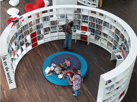 Curved, lightweight feeling shelves from a European library Unusual Bookshelf, Public Library Design, Creative Bookshelves, Industrial Bookshelf, Cool Bookshelves, Library Inspiration, Childrens Library, Library Shelves, Bookcase Design