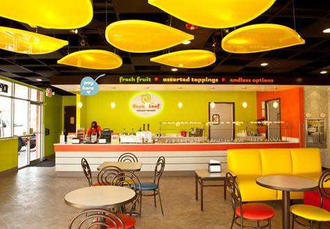 Love the cool decor hanging from the ceiling! Dairy Shop Interior Design, Cereal Restaurant, Eatery Design, Dairy Shop, Resturant Interior, Restaurant Plan, Kids Cafe, Frozen Yogurt Shop, Yogurt Shop