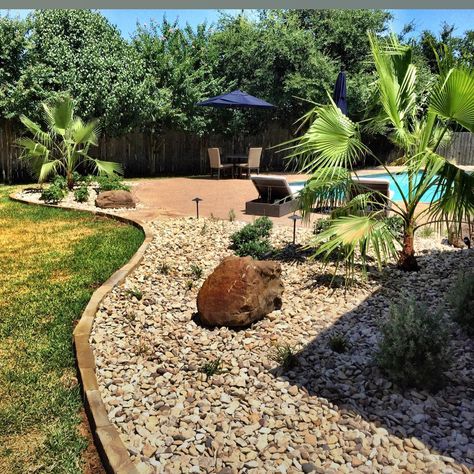 Rock Garden By Pool, River Rock Pool Landscaping, River Rock Landscaping Around Pool, Rock Beds Around Pool, Rock Bed Around Pool, Rock Landscape Around Pool, River Rock Around Above Ground Pool, Rocks Around Pool Landscape Design, Pool Edge Landscaping