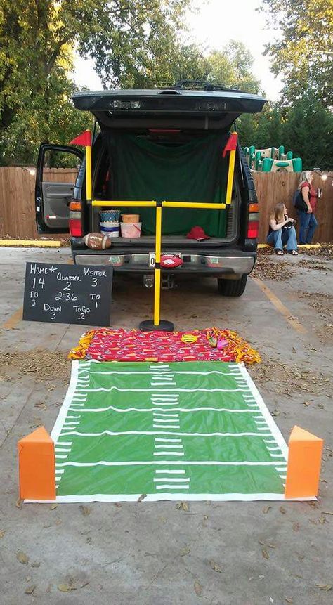 My football themed trunk or treat. Football Trunk Or Treat, Church Trunk, Halloween Car Decorations, Trunker Treat Ideas, Trunk Or Treat Ideas, Harvest Fest, Football Themes, Garden Birthday, Treat Ideas