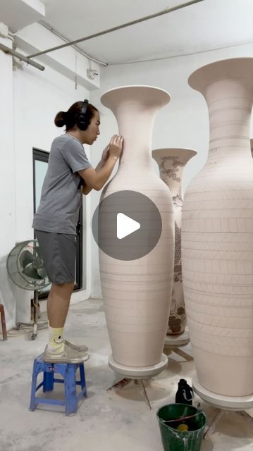 Micah Lewis-Văn Sweezie on Instagram: "it’s wild to work on a vase that’s taller than you  while studying in Bát Tràng, I had the amazing opportunity to decorate some large vases - this is the largest scale I’ve ever worked at. this project would not have been possible if it weren’t for all the amazing artisans who helped me the whole way. it was truly beautiful to work alongside these skilled artists and to witness the breadth of collaborative production within the ceramic process. more documentation to come…  #clay #ceramic #ceramics #pottery #art #craft #ceramicart #clayart #porcelain #handmade #vase #tire #battrang" Big Ceramic Vase, Big Ceramics Projects, Porcelain Handmade, Pottery Idea, Large Vases, Large Ceramic Vase, Handmade Vase, Vase Shapes, Ceramics Pottery Art