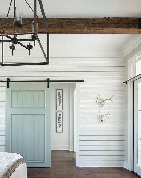 Farmhouse style is a trend that just won't go away—and we're still obsessed! Modern Farmhouse Sunroom, Shiplap Bedroom, White Shiplap Wall, Sunroom Decorating, Farmhouse Paint, White Shiplap, Cottage Bedroom, Interior Barn Doors, Farmhouse Bedroom