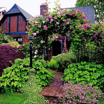 Tudor Curb Appeal. I'd love to see this every morning while I have my coffee. I just would need a yard BOY! Please!!  Haha Cottage Front Yard, Tudor Cottage, Brick Walkway, Tudor Style Homes, English Tudor, Brick Exterior House, English Cottage Garden, Casa Exterior, Tudor House