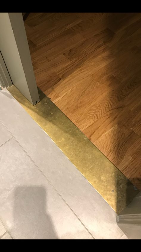 Brass Threshold Brass Strip Floor, Metal Flooring Transition, Brass Threshold Strip, Flooring Threshold Transition, Brass Threshold Transition, Floor Threshold Transition, Transitions Between Tile And Wood Floors, Creative Floor Transitions, Metal Floor Transition