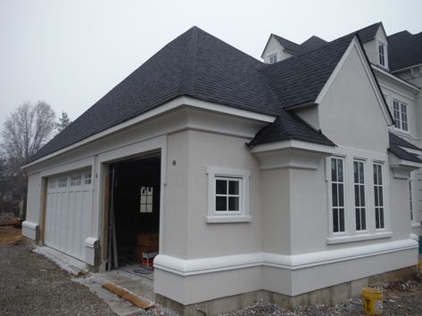 Siding And Stucco Exterior, White Stucco House With White Windows, Light Gray Stucco Exterior, Grey Exterior House Colors Stucco, Black Roof White Windows, Off White Stucco House Exterior, Beige Stucco House Exterior, Stucco Window Trim Exterior, Stucco Update