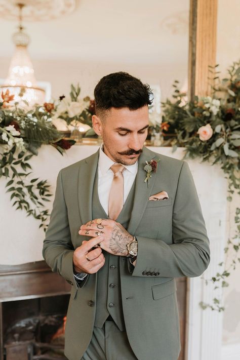 Groom in three piece green wedding suit and pink tie with matching pink pocket square Mens Winter Wedding Outfit, Suit Colors For Men Wedding Spring, Sage Green Wedding Men, Green Suit For Groomsmen, Double Breasted Suit Groom, Khaki Suit With Sage Green, Men’s Spring Wedding Suit, Groom Suits Green, Light Color Wedding Suit