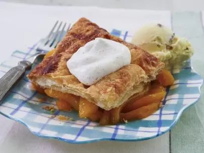 Peach Slab Pie Recipe | Katie Lee Biegel | Food Network Peach Slab Pie, Peach Puff Pastry, Slab Pie Recipes, Apple Slab Pie, No Bake Banana Pudding, Lemon Cream Pies, Butter Pecan Ice Cream, Cherry Pie Recipe, Frozen Lemon