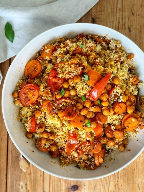 A bowlful of healthy vegan fluffy Moroccan couscous featuring spices, roasted carrots, juicy tomatoes and herbs Vegetarian Cous Cous Recipes, Fall Couscous Recipes, Chickpea Couscous Recipes, Chickpea And Couscous Recipes, Hot Couscous Recipes, Couscous With Chickpeas, Spicy Couscous Recipes, Vegetarian Couscous Recipes, Couscous Recipes Salad