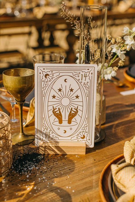 This ’70s-Inspired Wedding In The California Desert Featured Tarot Card Readings & An Aura Photographer | British Vogue Tarot Party Theme, Tarot Card Wedding Centerpieces, Wedding Invitations Tarot, Tarot Themed Wedding, Tarot Card Wedding Invitation, Tarot Card Wedding, Tarot Wedding, California Desert Wedding, Card Table Sign