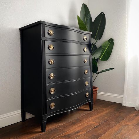 "FREE SHIPPING! We always hope for a quicker delivery but due to the size and nature of the pieces please allow up to 5-6weeks for delivery of orders. Sorry this piece has since sold SOLD- Gorgeous vintage tall dresser chest of drawers. Professionally refinished and painted in matte black with antique brass hardware. This mahogany dresser has 4 smooth drawers, the bottom two are double deep for extra storage of bulkier items such as sweaters or sweatshirts. This is a quality made vintage piece b Black Dresser With Brass Hardware, Black Dresser Gold Hardware Bedroom, Black Tallboy Dresser, Vintage Tall Boy Dresser, Tall Black Dresser Bedroom, Tall Black Dresser, Dark Desk, Waterfall Dresser, Chalk Paint Dresser