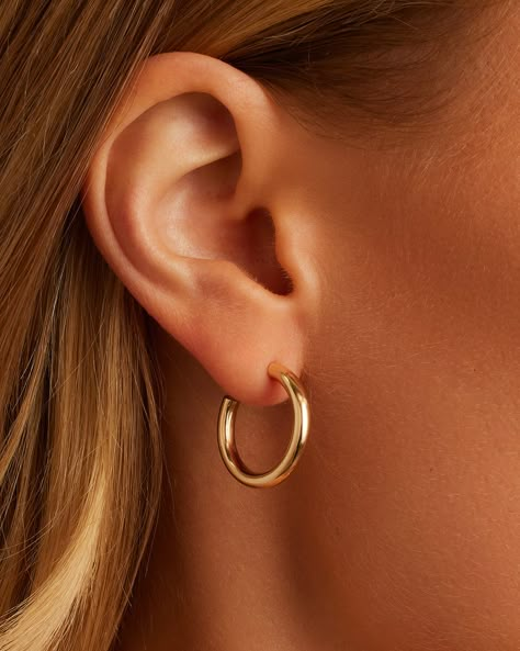 Elevate any outfit with these timeless solid gold hoop earrings. These 14k solid gold hoop earrings are perfect for every day wear thanks to their lightwieght feel and comfort backing. Stack your hoops with diamond studs or an additional pair of hoop earrings in your second piercing. Carter Hoops Earring, 14k Solid Gold 20mm, Women's by gorjana Trendy Gold Hoop Earrings, Earrings Single Piercing, Hold Hoops Earrings, Minimalist Hoop Earrings, Wide Hoop Earrings, Gold Earring Hoops, Silver Everyday Earrings, Solid Gold Hoop Earrings, Gold Jewelry Hoops