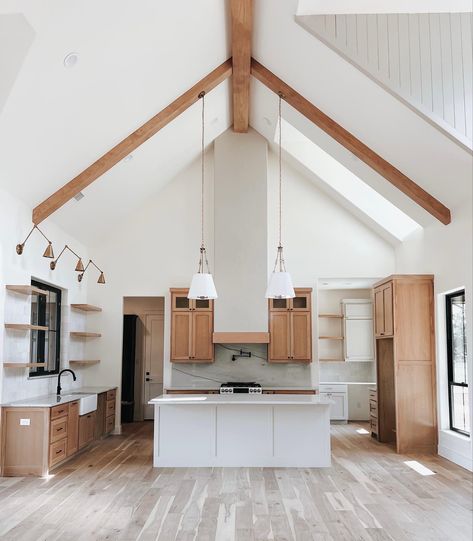 Modern farmhouse kitchen inspiration with vaulted ceilings. Open concept space. Tall Ceiling Kitchen, Modern Farmhouse Kitchen Design, Cathedral Ceiling Living Room, Kitchen Design Farmhouse, Kitchen With High Ceilings, Beams Living Room, Vaulted Ceiling Kitchen, Farmhouse Kitchen Inspiration, Unique Kitchen Design