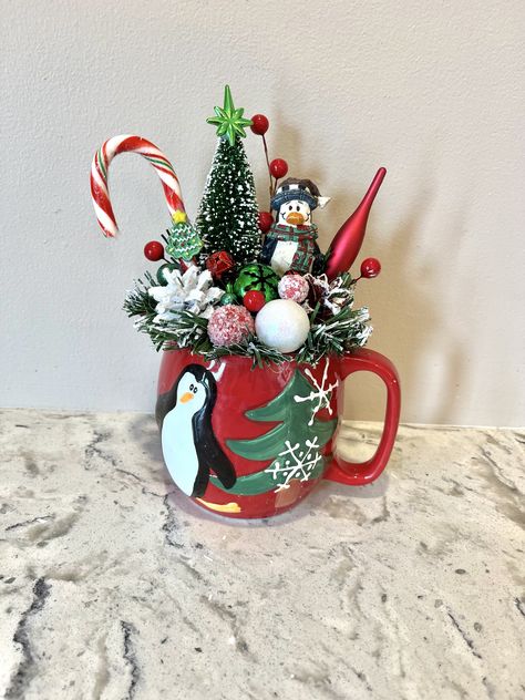 One of a Kind Christmas Creations Christmas Mug Craft, Christmas Tea Cup Decorations, Coffee Mug Centerpiece Ideas, Christmas Mug Decor, Sand Creations, Coffee Cup Crafts, Gnome Ideas, Christmas Tea Party, Advent Box