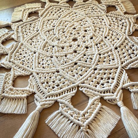 Not your grandma's doily!  A modern mandala spin on a classic decor item.  Made of hand-tied macrame knots using 4mm cotton rope, this round table runner, doily, or centerpiece decor will be a beautiful accent for any room of the house.  This item is handmade to order by fiber artist Christina Renee in the lastest trending colors.  All colors are 100% cotton made from recycled clothing. Additional customization is available upon request.  Please send a message about color and size options not li Macrame Table Placemat, Macrame Round Tablecloth, Macrame Table Mat, Macrame Round Table Runner, Round Table Runner, Macrame Carpet, Macramé Coster, Macrame Round Table Mat, Macrame Round