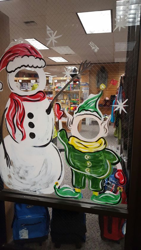 Window art done by kmaria arts in soldotna alaska Christmas Window Designs Chalk, Window Art For Christmas, Library Window Painting, Santa Window Art, Snowmen Window Painting, Christmas Window Display Paint, Painted Window Art Christmas, Painting Christmas Windows, Window Art For Business