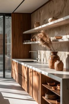 Industrial Japandi Kitchen, Japandi Home Bar, Kitchen Countertop Inspiration, Kitchen Design Without Upper Cabinets, Wabi Sabi Kitchen Cabinets, Japandi Interior Kitchen, Wabi Sabi Kitchen Design, Fluted Kitchen Cabinets, Slab Cabinets Kitchen