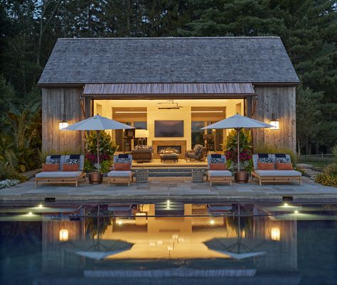 Washington Pool House — Haver and Skolnick Architects Flat Roof Pool Cabana, Garden Makeover Ideas, Exterior Sconces, Barn Pool House, Evening Lighting, Barn Pool, Retractable Glass Doors, Pool Lighting, Pool House Designs