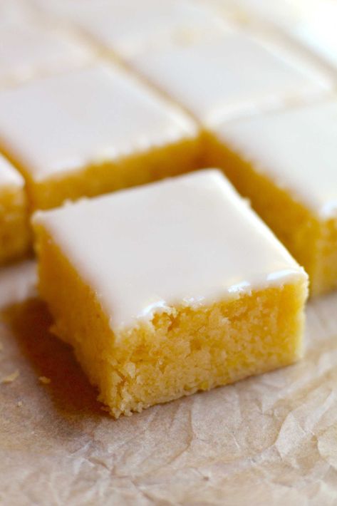 Lemon Blondies | 12 Tomatoes Lemon Blondies, Poured Icing, Homemade Lemon Bars, Lemon Bars Recipe, Lemon Drizzle, 12 Tomatoes, Lemon Extract, Lemon Bars, Bars Recipe