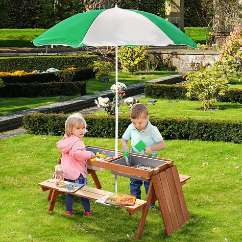 Picnic Table Set: Give your kids a space of their own for playtime, snack time, and more. This picnic table can be used in gardens, backyards, or out on the beach. Picnic Table for Kids Information: Overall Dimensions: 36.5" L x 33.5" W x 19" H (Without Umbrella). 51.25" L x 43.25"-66.5" H (Sun Umbrella). Suitable for Kids: 3-6 Years Old. Kids Outdoor Table, Picnic Table With Umbrella, Water Table Activities, Kids Table Set, Kids Picnic Table, Table With Umbrella, Kids Picnic, Kids Outdoor Furniture, Sand And Water Table