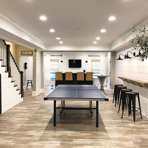 What a beautiful basement space! Loving the LVT flooring! #Inspiration #LVT #Basement #Shiplap #GreenBasementsandRemodeling #roswellRemodel #AtlantaConstruction Remodeling Trends, Basement Games, Basement Inspiration, Game Room Basement, Basement Living Rooms, Diy Basement, Basement House, Small Basements, Basement Makeover