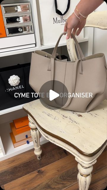 Handbag Angels on Instagram: "A closer look at our viral handbag organiser for the Polène Cyme Tote: 

The Polène Cyme sadly has zero internal pockets, and has a very pale, delicate suede interior. That’s why we have devised the perfect organizer with internal pockets, to help protect inside the bag from marks & stains. 

Our organizer comes with internal pockets as standard, and you also have the option to choose from a variety of extras such as a zip top, key strap & bottle holder. 

We have 21 gorgeous felt colours to choose from, and hand craft all of our organisers in the UK. 

#polenecyme #cymetote #bagorganizer #luxuryfashion" Tote Bag Organizer, Handbag Organization, Bag Organization, Bottle Holders, About Uk, Luxury Fashion