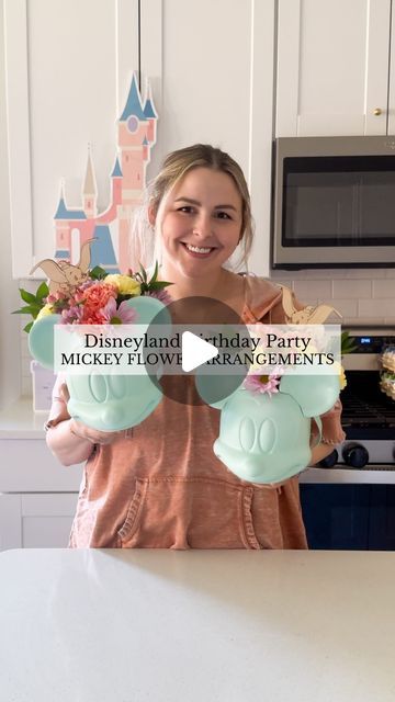 Sierra Miller | Content Creator on Instagram: "Did you guess right?! 👀 So excited to get these on the tables tomorrow and suddenly wishing I did more 🤦🏻‍♀️😂😅  . . . . . . . #disneyparty #disneylandparty #disneylandbirthday #mickeybirthday #mickeymousebirthday #mickeymousebirthdayparty #minniemousebirthday #diypartydecor #flowerarrangement #floralcenterpiece" Disney Birthday Party Centerpieces, Vintage Disneyland Centerpiece, Disney Vintage Birthday Party, Disneyland Theme Centerpieces, Disneyland Centerpieces Birthday, Disneyland Theme Baby Shower Ideas, Disney Table Centerpieces, Disneyland Centerpieces, Disneyland Theme Birthday Party