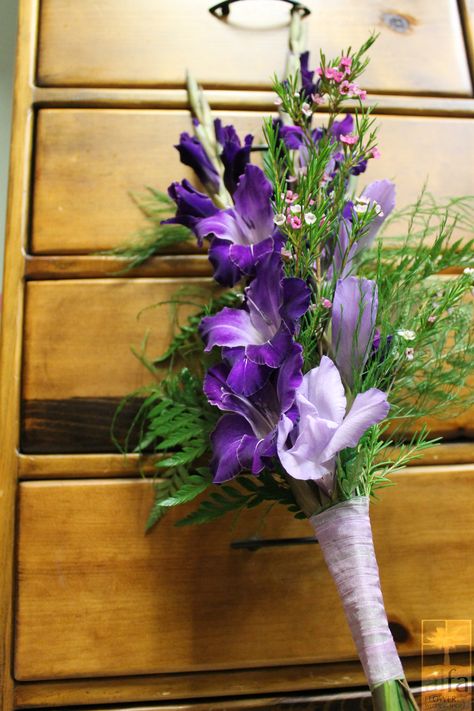 Gladiolas make a great statement in this bouquet. Gladiolus Flower Wedding, Gladiolus Bridal Bouquet, Gladioli Drawing, Gladiolus Wedding Bouquet, Gladioli Tattoo, Gladiolus Wedding, Gladiolus Bouquet, Gladiolus Arrangements, Purple Flowers Garden