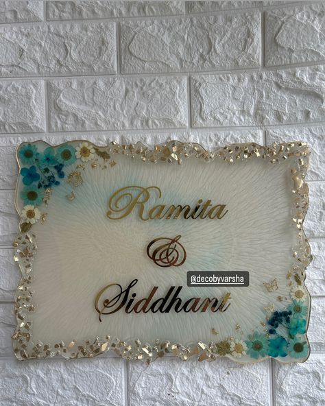 Decorate your Home entrance with these beautiful Handmade Resin Name plate ❤️ Customisation can be done Dm for details Resin name plate, Bangalore resin artist , name plate design, Resin Name Plates For Home, Entrance Name Plate Design, Handmade Name Plates For Home, Resin Art Name Plate, Nameplate Ideas, Name Plate For Home, Resin Name Plate, Resin Nameplate, Varmala Preservation