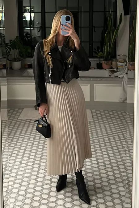 fall date night outfit - maxi skirt, tall boot, leather jacket 🖤 (the black skirts here come in a toasted ivory color too if you click them) Maxi Skirt Boots Outfit, Cream Pleated Skirt Outfit, Black Pleated Midi Skirt Outfit, Maxi Pleated Skirt Outfit, Leather Maxi Skirt Outfit, Midi Pleated Skirt Outfit, Pleated Leather Skirt Outfit, Cream Skirt Outfit, Pleated Maxi Skirt Outfit