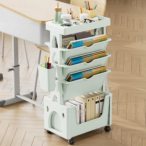 PRICES MAY VARY. Unique Design：The unique design of this rolling book shelf with wheels allows for easy access to your books from both sides, making it convenient for quick retrieval or storage. Sturdy Construction: The sturdy construction of the unique bookshelf ensures durability and long-lasting use, making it a reliable and practical storage solution. Complementary: The white bookshelf adds a touch of style to any space, complementing a variety of interior decor styles. Wide Application: The Homeschool Book Storage, Coloring Book Organization, Book Organization Small Spaces, College Storage Ideas, Kallax Office, Teacher Gadgets, Unique Bookshelf, Artist Room, White Bookshelf