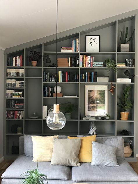 Living Room Built Ins Angled Ceiling, Bookcase On Slanted Wall, Built In Shelves Sloped Ceiling, Slanted Built In Bookshelf, Sloped Ceiling Shelving, Bookshelf Sloped Ceiling, Built Ins On Angled Wall, Bookcase On Angled Wall, Bookcase Sloped Ceiling