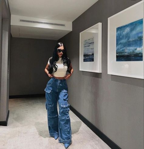 Cargo Jeans Outfit Casual, Denim With Heels Outfit, High Waist Cargo Jeans Outfit, Corset Tops And Cargo Pants, Cargo Jeans With Crop Top, Straight Leg Cargo Jeans Outfits, Dark Denim Cargo Pants Outfit, Blue Jeans Cargo Pants Outfit, Cargo Jeans And Heels