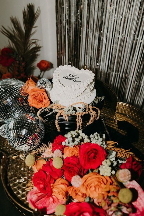 Alternative Disco Wedding Inspiration | IG: Wedding Venue - @thebrownstoneyyc Beauty - @devotedtoyouartistry Wedding Flowers - @pineforcedar Wedding Photography - @erikalagyphoto Wedding Gown - @mish.elle.bridal @taffetaandtullebridal Wedding Gowns - @thebridalboutiqueyyc Wedding Cake - @bakemydayyyc Decor & Rentals - @flowerwallsyyc #weddinginspo #retrowedding #discowedding Evening Wedding Decor, Disco Wedding, Rock Wedding, When I Get Married, Cool Wedding Cakes, Geometric Wedding, Disco Balls, Retro Wedding, Cute Wedding Ideas